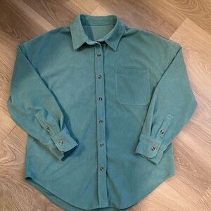 Green/teal shacket. Great for layering.
